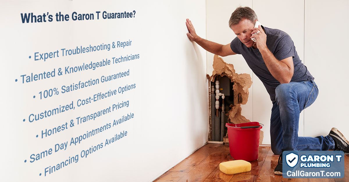 Man on phone kneeling by water damaged wall with text asking, What's the Garon T Guarantee? Expert troubleshooting and repair, talented technicians, 100% satisfaction guarantee, customized cost-effective options, honest and transparent pricing, same day appointments, financing available.
