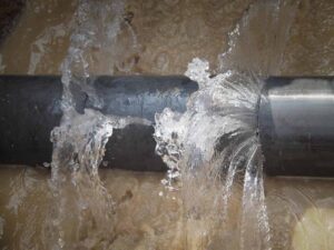 water spurting out from a damaged pipe