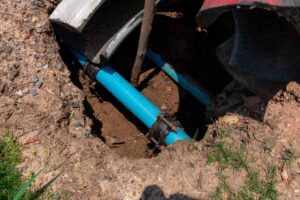 Garon T technician working on a water line repiping project